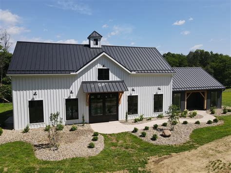 pictures of barn seam metal roofs on houses|board and batten metal roof exterior.